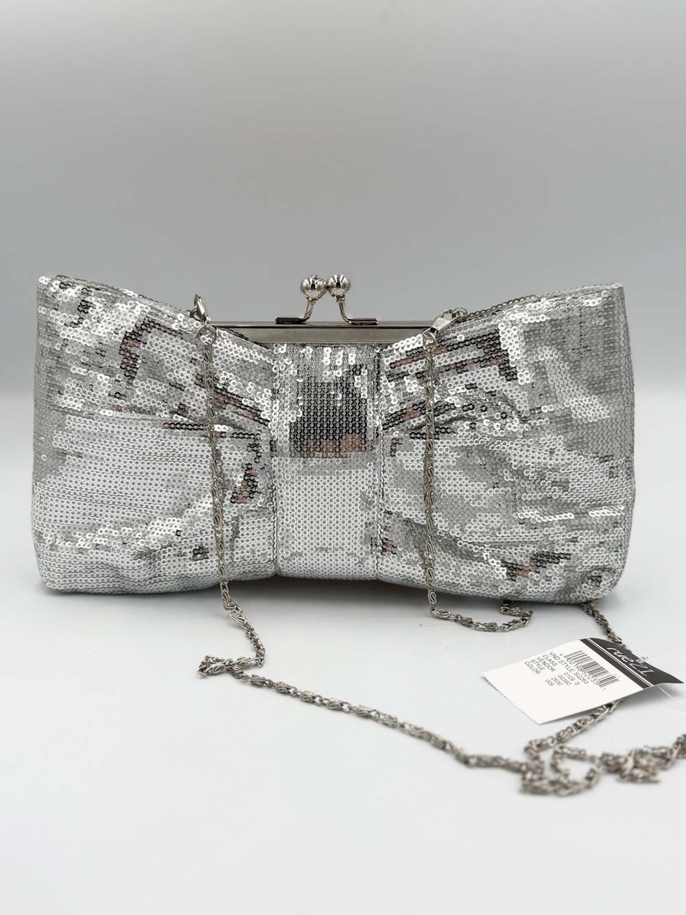 Rue21 Silver Sequin Kiss Lock Bow Clutch with Chain Strap